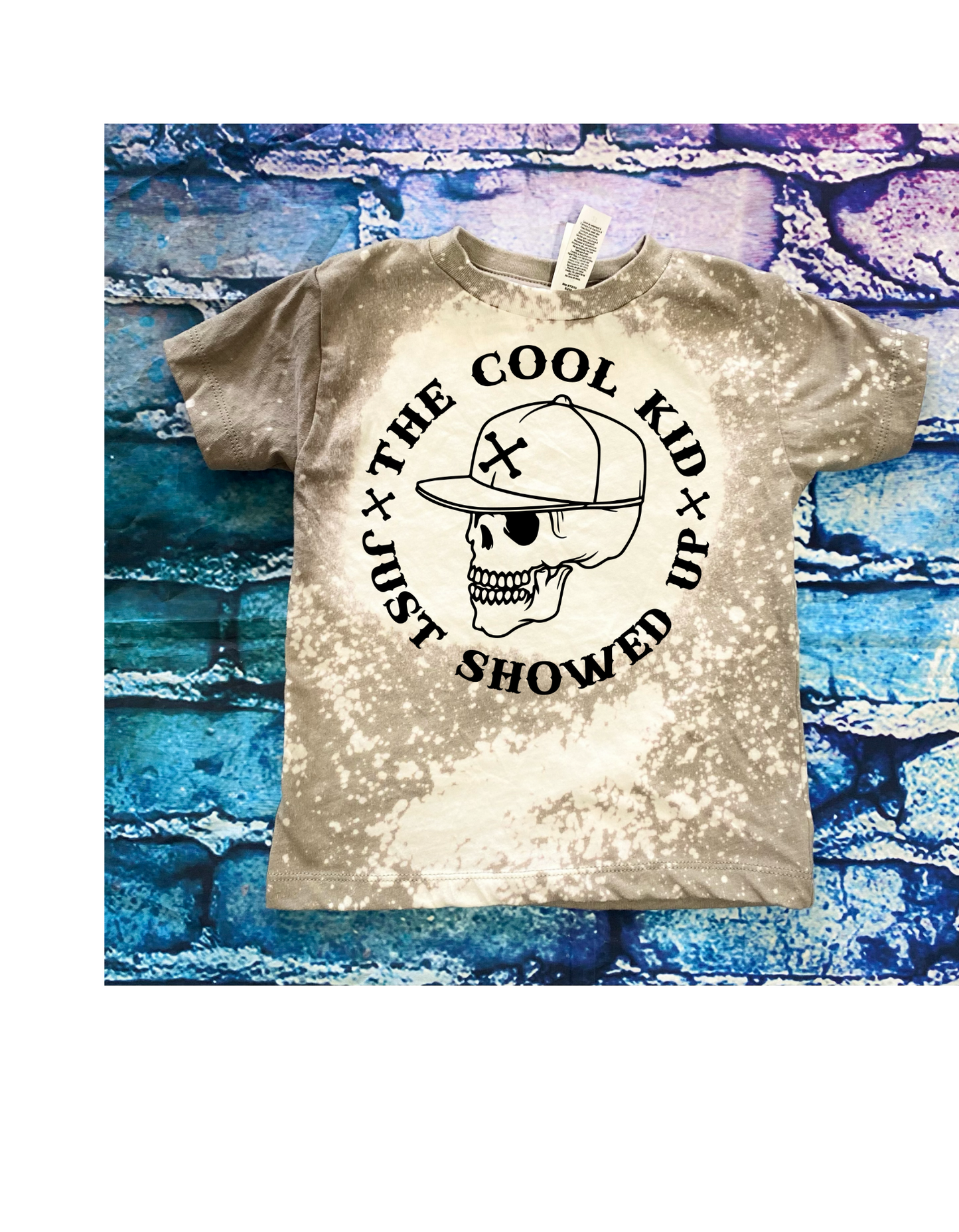 The cool kid just showed up bleached kids tee